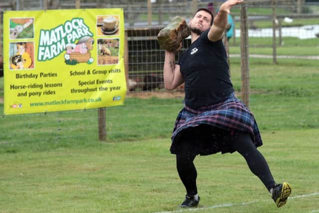 The contestants take part in a very wet and windy Highland Games in Matlock, United Kingdom, 26thAugust 2018. Photo by Glenn Ashley.