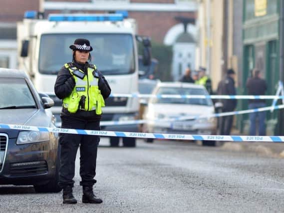 Police and the bomb squad on Sheffield Road in Chesterfield in December last year.