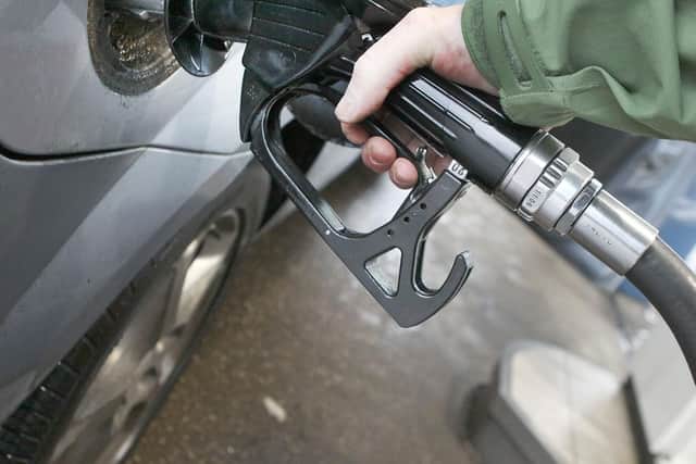 Is it illegal to leave your child alone in the car while you're at a petrol station?