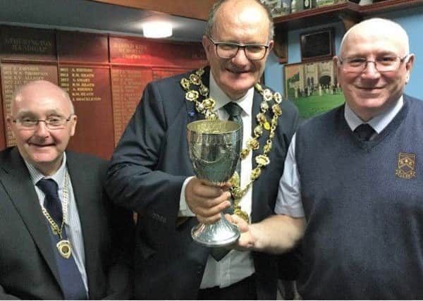 Chesterfield Bowling Club president Bob Meakin, Chesterfield mayor Stuart Brittain and  Mayor's Charity Cup winner Geoff Mitchell, pictured left to right.