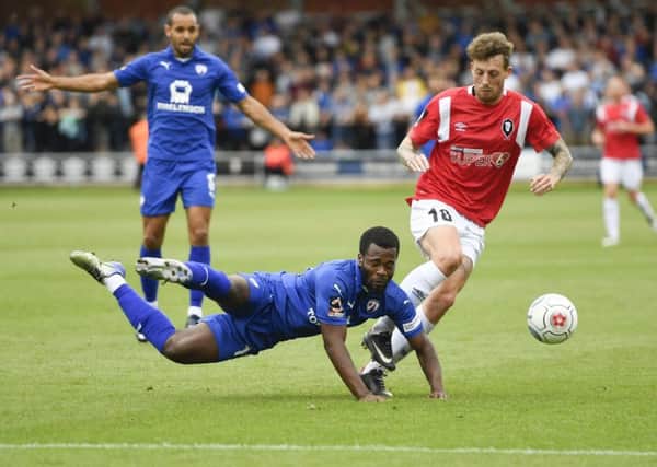 ChesterfieldÃ¢Â¬"s Zavon Hines tussles for the ball with Salford's Danny Whitehead: Picture by Steve Flynn/AHPIX.com, Football: Vanarama National League match Salford City -V- Chesterfield at Peninsula Stadium, Salford, Greater Manchester, England copyright picture Howard Roe 07973 739229
