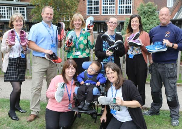Staff from Whaley Thorns Primary who are runnning the half marathon to raise funds for a walker for pupil George.