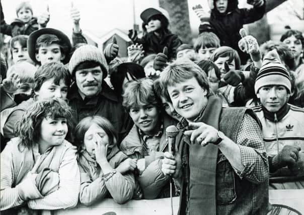 Cheggars played pop and proved the tops when BBC's Superstore came to Chesterfield in January, 1985
Bubbling Keith Chegwin proved a big hit with hundreds of Chesterfield youngsters who braved the cold and occasional snow flurry to greet him.
And he led them through a feast of fun and games as the Superstore set up shop outside Chesterfield Town Hall.