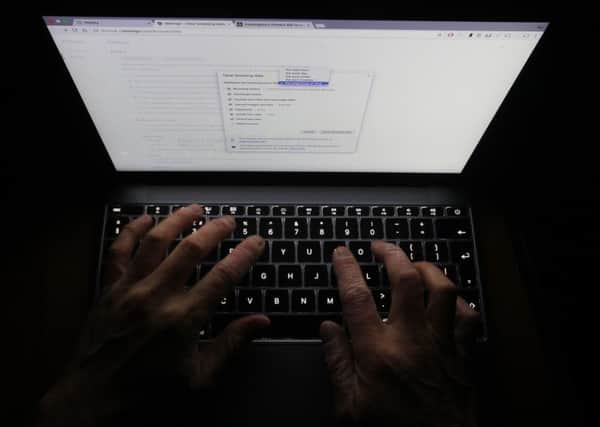 File photo dated 30/11/2016 of a person using a laptop. The biggest overhaul of data privacy regulation in the history of the internet comes into force one month from today. From May 25 in the EU, the new General Data Protection Regulation (GDPR) will give regulators greater power to levy large fines on firms who mishandle data, as well as hand users new powers to access and control their data.