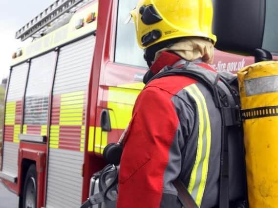 Firefighters are currently tackling a fire at three derelict cottages in Ambergate.