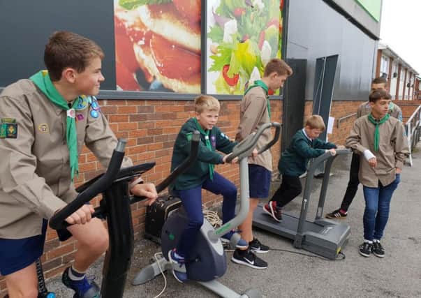 3rd Holmesfield Scouts raise awareness at Dronfield's Hartington Road Co-op of the Big Moor Fell Race and family walk on October 13.