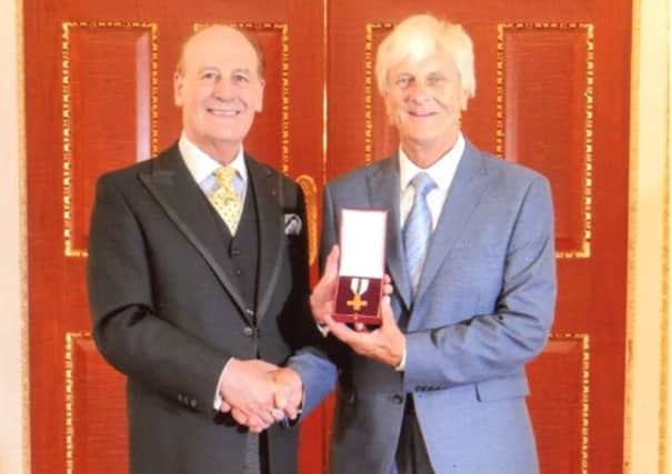 Tom Pilkington receives his award from the Rt Hon The Lord Lingfield at The Mansion House, London