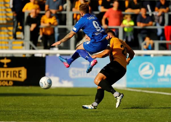 Picture by Matt Bristow/AHPIX.com;Football;Vanarama;Conference Premier;
Maidstone United v Chesterfield FC;
29/09/2018  KO 3.00pm; The Gallagher Stadium;
copyright picture;Matt Bristow;07973 739229

Chesterfields forward Lee Shaw leaps over Maidstone's defender Jack Doyle as he challenges.