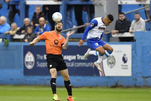 ChesterfieldÃ¢Â¬"s Michael Nelson beats Barrow's Tyler Smith to a header: Picture by Steve Flynn/AHPIX.com, Football: Vanarama National League match Barrow -V- Chesterfield at Holker Street, Barrow, Cumbria, England copyright picture Howard Roe 07973 739229