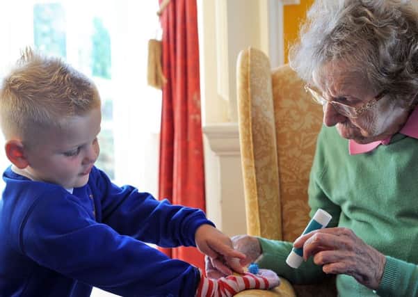 Whaley Thorns Primary School pupil, Cooper Robinson befriends Margaret Egley at the Langwith Lodge home, who he visits on Monday mornings as part of the School's Project Smille.