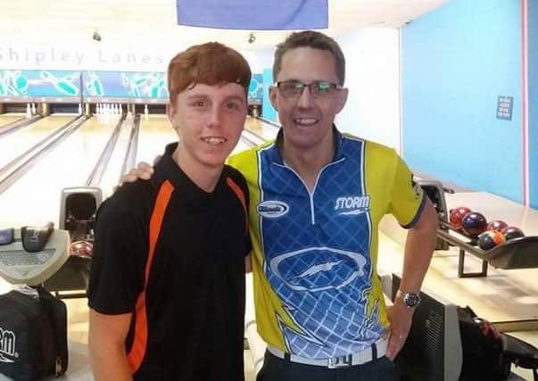 Tom is pictured with Martin Larsen, a professional ten pin bowler from Sweden