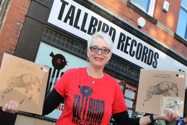 Maria Harris of Tallbird Records with their first record released on the shop's fifth anniversary