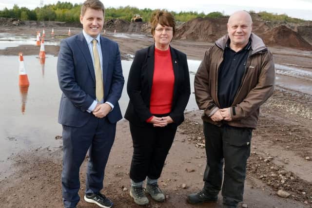 Chris Hobson, East Midlands Chamber of Commerce director of policy, Councillor Tricia Gilby, leader Chesterfield Borough Council and Mervyn Allcock, general manager Barrow Hill at the site.