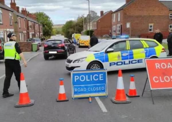 Pictured is Rotherham Road, at Killamarsh, which was cordoned off by police after a reported shooting on September 30.