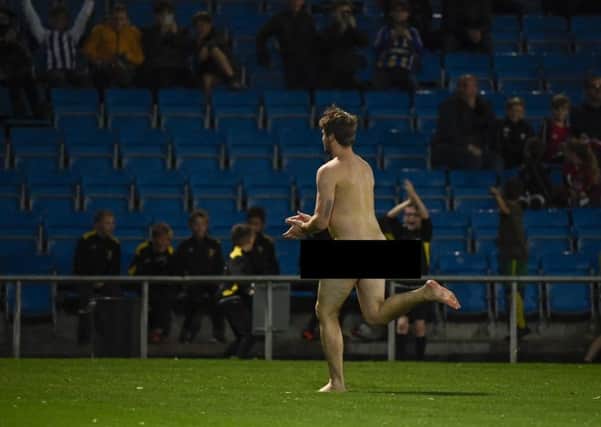 A streaker invaded the pitch: Picture by Steve Flynn/AHPIX.com, Football: Vanarama National League match FC Halifax Town -V- Chesterfield at The Shay, Halifax, West Yorkshire, England on copyright picture Howard Roe 07973 739229
