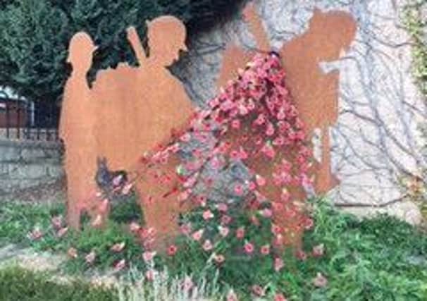 The Matlock in Bloom committee has completed its final changes to the evolving First World War memorial flower bed in Hall Leys Park ahead of the Armistice centenary on November 11