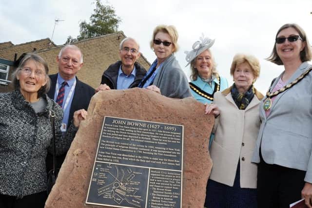 Pictured at the unveiling of the John Bowne memorial plaque are, from left, Judith Green representing the Quakers, Mark Taylor of Waterloo Housing Group, Tony Symes chairman of the Matlock Civic Association, American visitor and Bowne descendent Christine Schaller, Derbyshire Dales district chairman Jean Monks, Rosemary Vietor from the Bowne House Historical Society, and Mayor of Matlock Helen Legood.