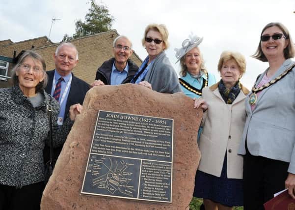 Pictured at the unveiling of the John Bowne memorial plaque are, from left, Judith Green representing the Quakers, Mark Taylor of Waterloo Housing Group, Tony Symes chairman of the Matlock Civic Association, American visitor and Bowne descendent Christine Schaller, Derbyshire Dales district chairman Jean Monks, Rosemary Vietor from the Bowne House Historical Society, and Mayor of Matlock Helen Legood.