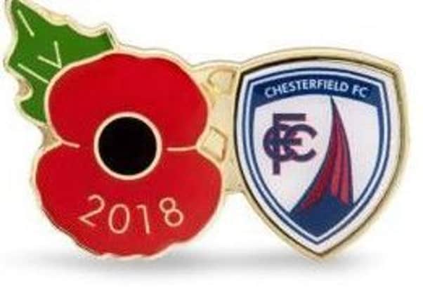 The Poppy pins incorporate the badges of Chesterfield FC and Derby County