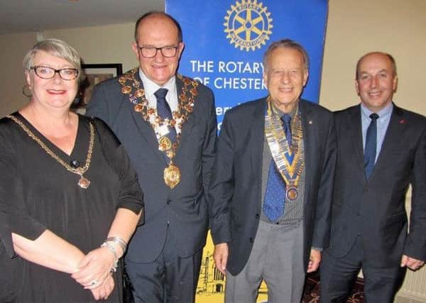 The  Mayor and Mayoress of Chesterfield, Councillor Stuart Brittain and his wife Anne, with Chesterfield Rotary president Barry Thompson (centre) and Chesterfield Borough Council chief executive Huw Bowen (right).
