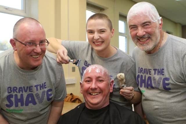 Paul Wagstaff, Agnieszka Pope, Julian Popple and Ryan Maddock after braving the shave.