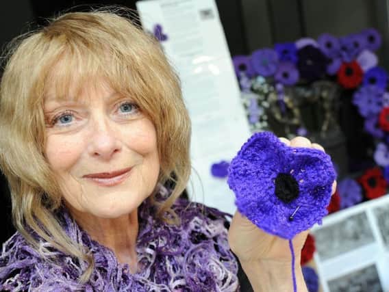 June Lane with her purple poppy display which was on show in Chesterfield. Picture by Anne Shelley.