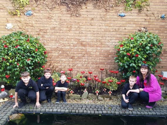 Pupils from Holly House School, Old Whittington, have created a remembrance garden. Pictured, left to right, are: Pictured, left to right, are Harrison Mitchell, Taylor Chadwick, Mason Beebys, Sam Bridges and teacher Mrs Yaghooby