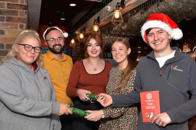 EinsteinÃ¢Â¬"s are offering a free Christmas lunch to the lonely, elderly and homeless this Christmas, picture includes Connor Siddall, Reece Gascoigne, Teri Leigh Smith, Ellie Mai Wainwright and Tamara Wonfor
