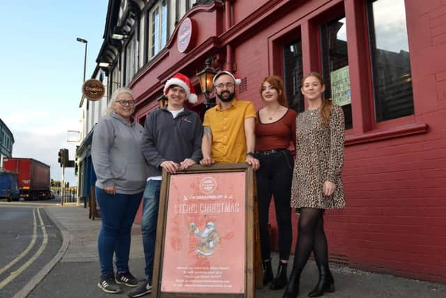 EinsteinÃ¢Â¬"s are offering a free Christmas lunch to the lonely, elderly and homeless this Christmas, picture includes Connor Siddall, Reece Gascoigne, Teri Leigh Smith, Ellie Mai Wainwright and Tamara Wonfor