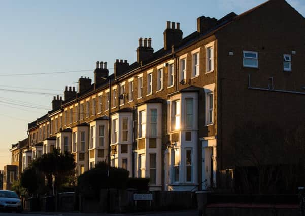 Undated file photo of terraced residential houses. Nearly a fifth of "bank of mum and dad" parents and grandparents are sacrificing their own standard of living in order to provide financial support to younger generations getting on the housing ladder, a survey has found.