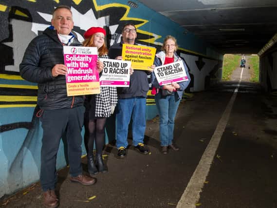 Members of the Chesterfield and north Derbyshire branch of the Stand Up To Racism group at the newly-painted underpass in Loundlsey Green. Picture submitted by Karl Barton.