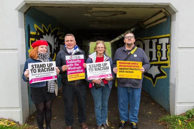 Members of the Chesterfield and north Derbyshire branch of the Stand Up To Racism group at the newly-painted underpass in Loundlsey Green. Picture submitted by Karl Barton.