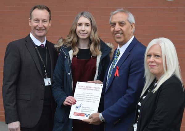Derbyshire Police and Crime Commisioner Hardyal Dhindsa, headteacher, Richard Marlow, business manager Angela Lindley and student Rebecca Hattersley  at the launch of the new sports facility at Clowne's Heritage High School.