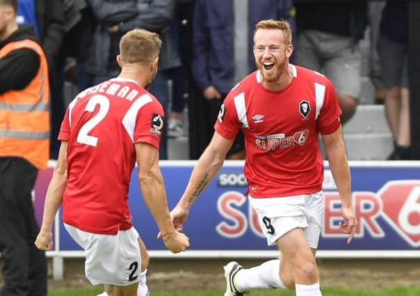 Salford's Adam Rooney celebrates scoring the opening goal with Scott Wisemans: Picture by Steve Flynn/AHPIX.com, Football: Vanarama National League match Salford City -V- Chesterfield at Peninsula Stadium, Salford, Greater Manchester, England copyright picture Howard Roe 07973 739229