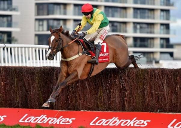 Sizing Tennessee striding to victory in the Ladbrokes Trophy at Newbury.