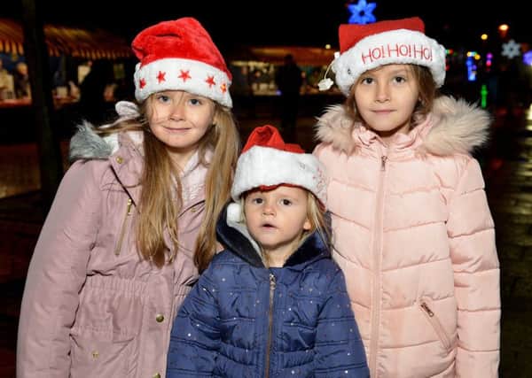 Staveley Christmas market, pictured are Surann, seven, Shaya, six and Olivia, three
