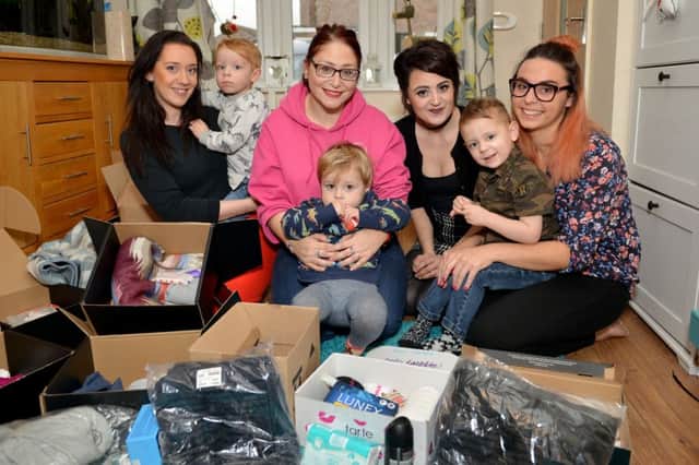 Fiona Boot has launched an initiative to give clothing and toiletries to the homeless this Christmas, pictured from left are Luci Smith, Billy Elliott, two, Fiona Boot, Arthur Bramley, two, Abi Thomas, Harvey Edwards, three and Alyshea Boot