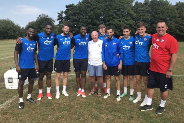 Chesterfield supporter Peter Stockton with Martin Allen and some of the current squad (Pic: Tina Jenner)