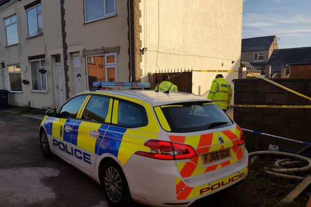 Police outside the home on Alfred Street, South Normanton.