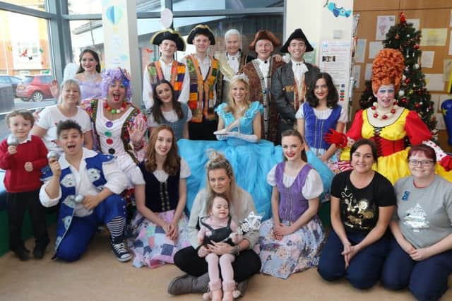Patients and staff in the childrens outpatient unit meet the stars of this years pantomime. Pictures by Jason Chadwick.