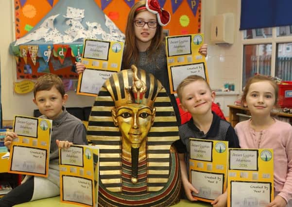 Egyptian magazine project, Charlie, Olivia, Daniel and Taya with the completed magazines