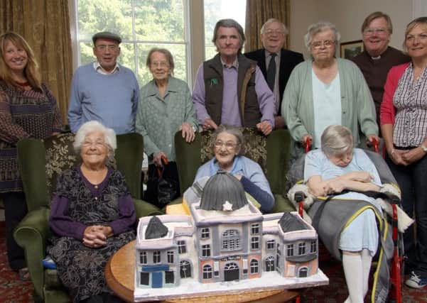 2007 - Save the pavillion group present pavillion cake to resident at Masson House Care Home
