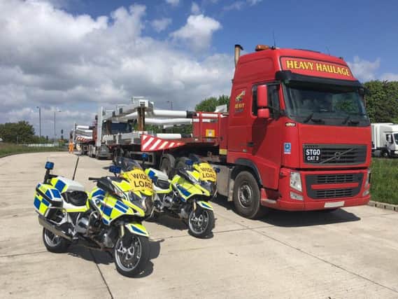Derbyshire Roads Policing Unit bikes with a wideload