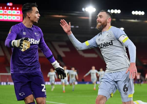 Jubilant Kelle Roos and Richard Keogh after Derbys penalty shootout win. (PHOTO BY: Dan Mullan/Getty Images).