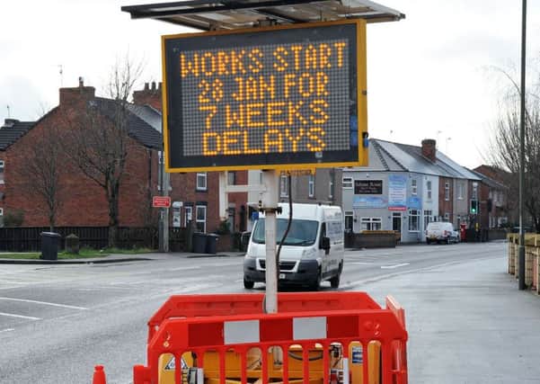 A61 notice of roadworks sign.
