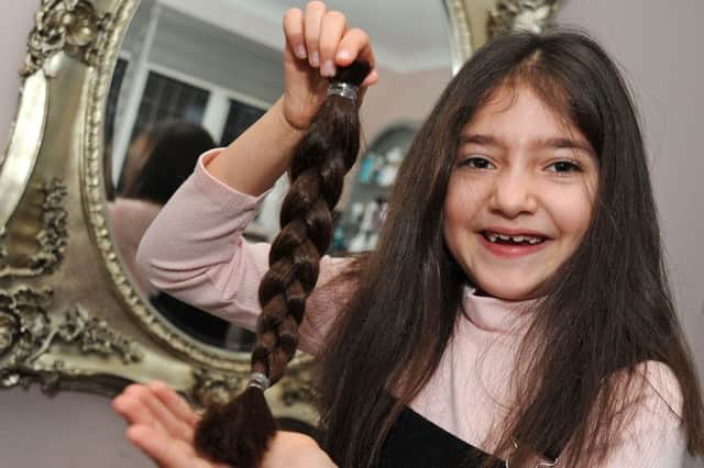 Antonia Nicolaou shows off her hair, cut for the Little Princess Trust. Pictures by Anne Shelley.
