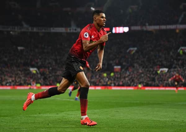 MANCHESTER, ENGLAND - JANUARY 19:  Marcus Rashford of Manchester United celebrates after scoring his sides second goal during the Premier League match between Manchester United and Brighton & Hove Albion at Old Trafford on January 19, 2019 in Manchester, United Kingdom.  (Photo by Gareth Copley/Getty Images)