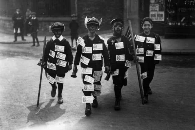 August 20 1913: Miners' children, wearing Unionist colours and waving the Union Jack, during the Chesterfield By Election. (Photo by Topical Press Agency/Getty Images)