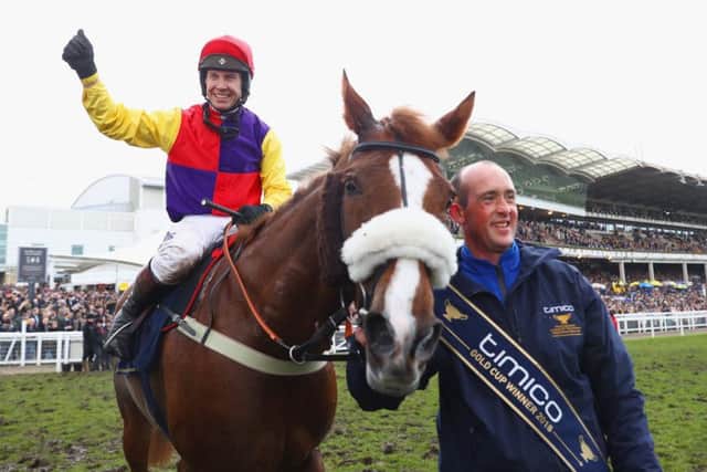 Thumbs up from champion jockey Richard Johnson after Native River's stirring victory in last season's Cheltenham Gold Cup. (PHOTO BY: Michael Steele/Getty Images).