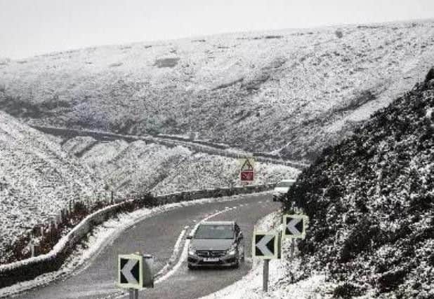 Road closures have been put in place due to snow and wind.